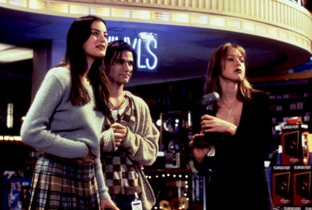 Empire movie photo print featuring Liv Tyler and Renee Zellweger in a record store.