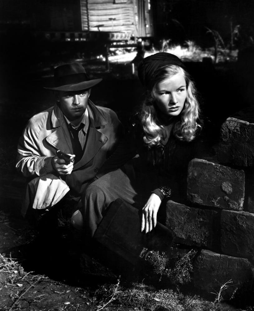 This Gun For Hire movie poster print featuring Alan Ladd and Veronica Lake, 1942.