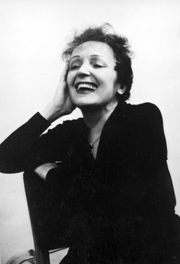 Edith Piaf laughing photo print, capturing the joy of the iconic singer.