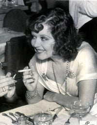Clara Bow Smoking Photo Print showcasing classic Hollywood glamour in multiple sizes.
