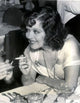 Clara Bow Smoking Photo Print showcasing classic Hollywood glamour in multiple sizes.
