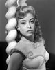 Gloria DeHaven black and white photo print leaning on a pole