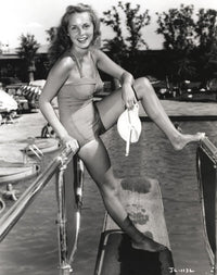 Janet Leigh vintage photo print in grey swimsuit posing by the pool.