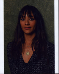 Rashida Jones stylish headshot photo print featuring a patterned top