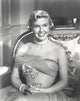 Doris Day seated in classic gown photo print.