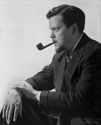 Orson Welles classic photo print featuring a pipe in his mouth.