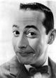 Peewee Herman wearing a bow tie photo print in multiple sizes.