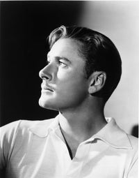 Errol Flynn classic movie photo print showcasing his iconic charm.