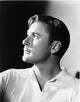 Errol Flynn classic movie photo print showcasing his iconic charm.