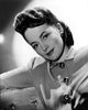 Olivia De Havilland 1943 photo print showcasing classic Hollywood elegance.