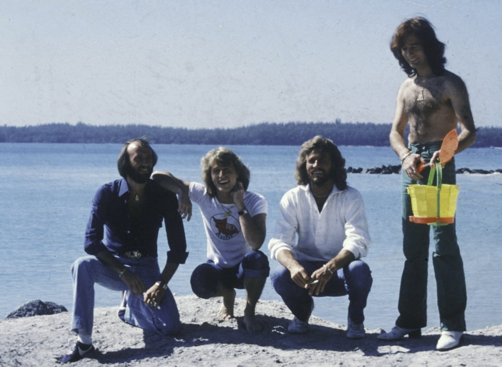 Bee Gees relaxing at the beach photo print