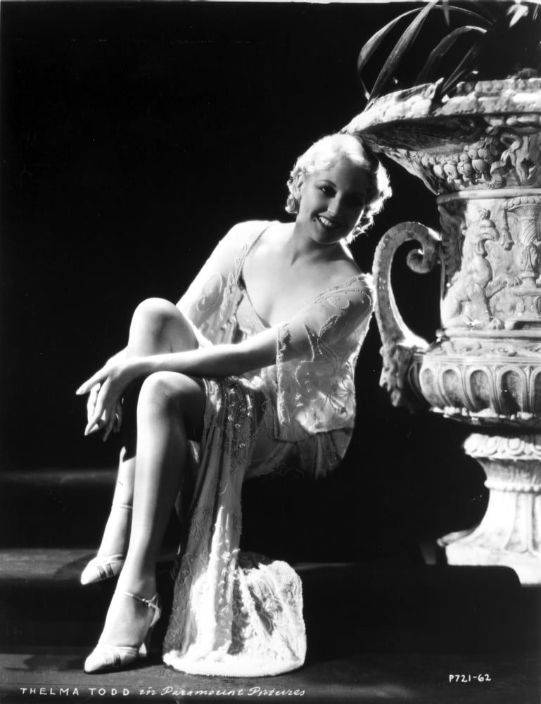 Black and white photo print of Thelma Todd seated elegantly.