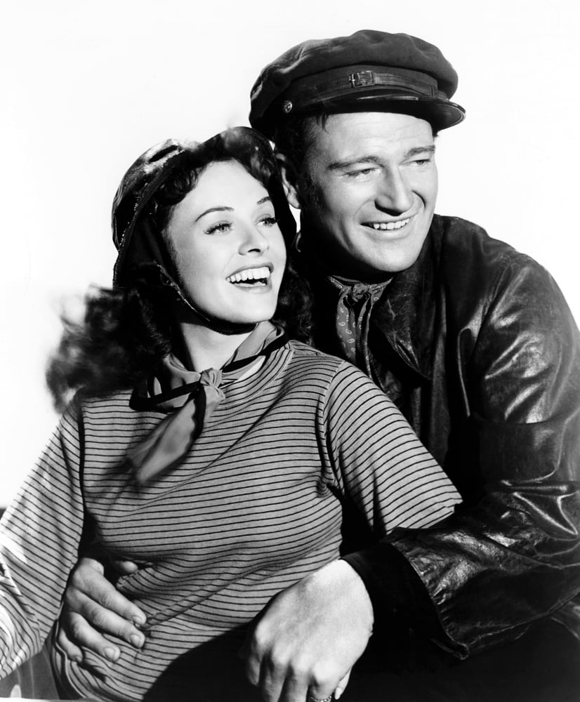 Reap The Wild Wind movie poster print featuring Paulette Goddard and John Wayne from 1942.