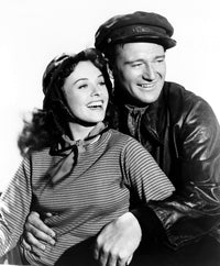 Reap The Wild Wind movie poster print featuring Paulette Goddard and John Wayne from 1942.