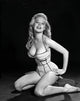 Betty Brosmer Cushion Photo Print showcasing vintage beauty