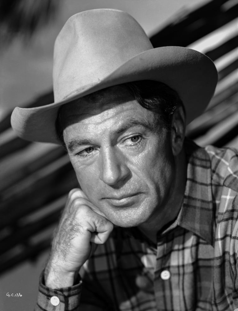 Gary Cooper Leaning on Hand Photo Print showcasing vintage Hollywood charm.
