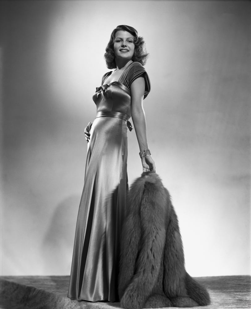 Rita Hayworth posed in a shiny gown photo print