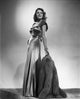 Rita Hayworth posed in a shiny gown photo print