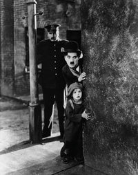 The Kid 1921 photo print featuring Charlie Chaplin and Jackie Coogan