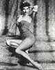 Ava Gardner posed in animal print lingerie photo print