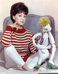Marlo Thomas sitting in a red and white sweater photo print.
