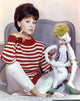 Marlo Thomas sitting in a red and white sweater photo print.