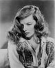 Black and white photo print of Katharine Hepburn posing elegantly.