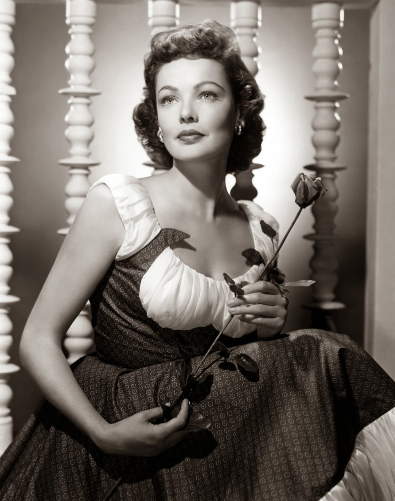 Gene Tierney holding a rose photo print.