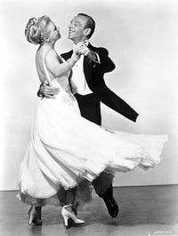 Fred Astaire and Ginger Rogers dancing photo print capturing classic Hollywood elegance.