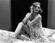 Adrienne Ames On Bed Photo Print, capturing vintage glamour in a stunning pose.