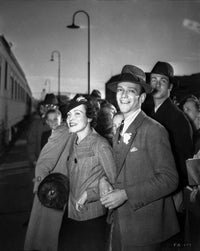 Fred Astaire waiting for train photo print in stylish suit.