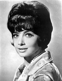 Suzanne Pleshette photo print wearing a printed blouse and pearl necklace.