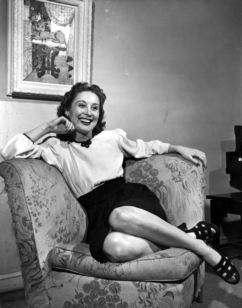 Betty Garrett sitting on a couch portrait photo print