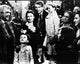 Black and white photo print of James Stewart and Donna Reed with children from It's A Wonderful Life