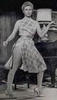 Photo print of Elizabeth Montgomery dancing in a dress.
