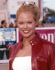 Krissy Carlson smiling in a red leather jacket portrait photo print
