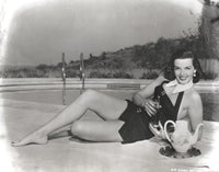 Jane Russell posed in a mini skirt photo print