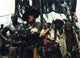 Geoffrey Rush as Hector Barbossa photo print in dynamic pose.