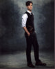 Matthew Gray Gubler photo print from Criminal Minds with hands in pockets and gun in holster.