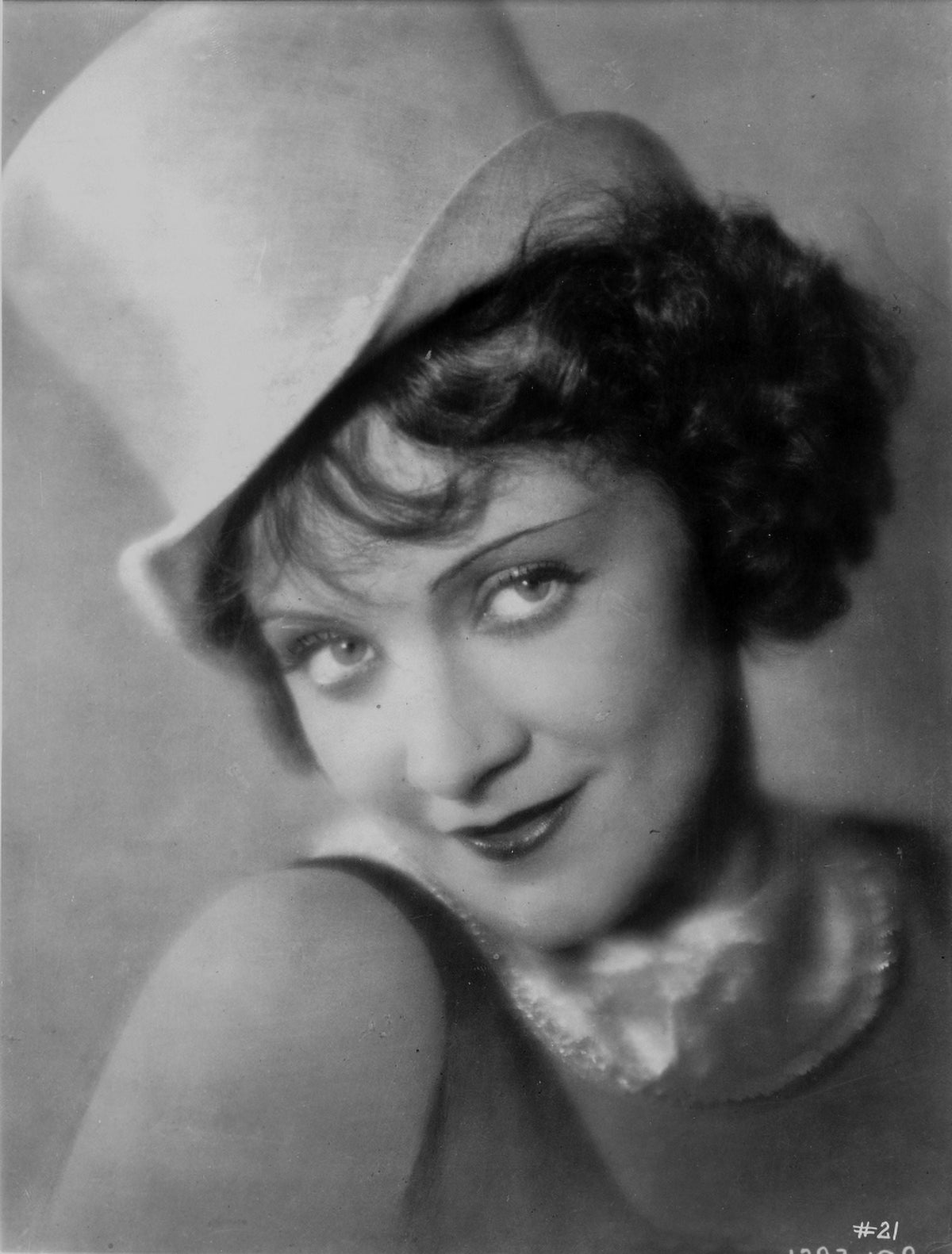 Marlene Dietrich classic portrait photo print featuring black dress and white hat.