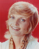 Florence Henderson smiling photo print showcasing her charm and warmth.