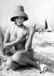 Elke Sommer Holding Tall Grass Photo Print - Elegant Nature Photography