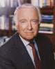 Walter Cronkite black suit photo print capturing iconic journalism.