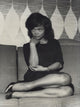 Eartha Kitt glamorous photo print lounging on a sofa.