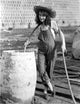 Fay Wray photo print filling up drum with water in jumper