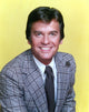 Dick Clark portrait photo print with yellow background
