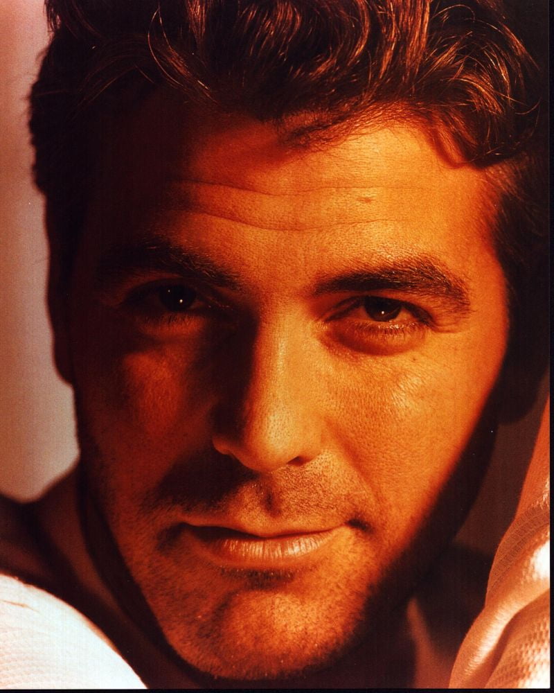 Close-up photo print of George Clooney smirking in 8x10 and 24x30 sizes