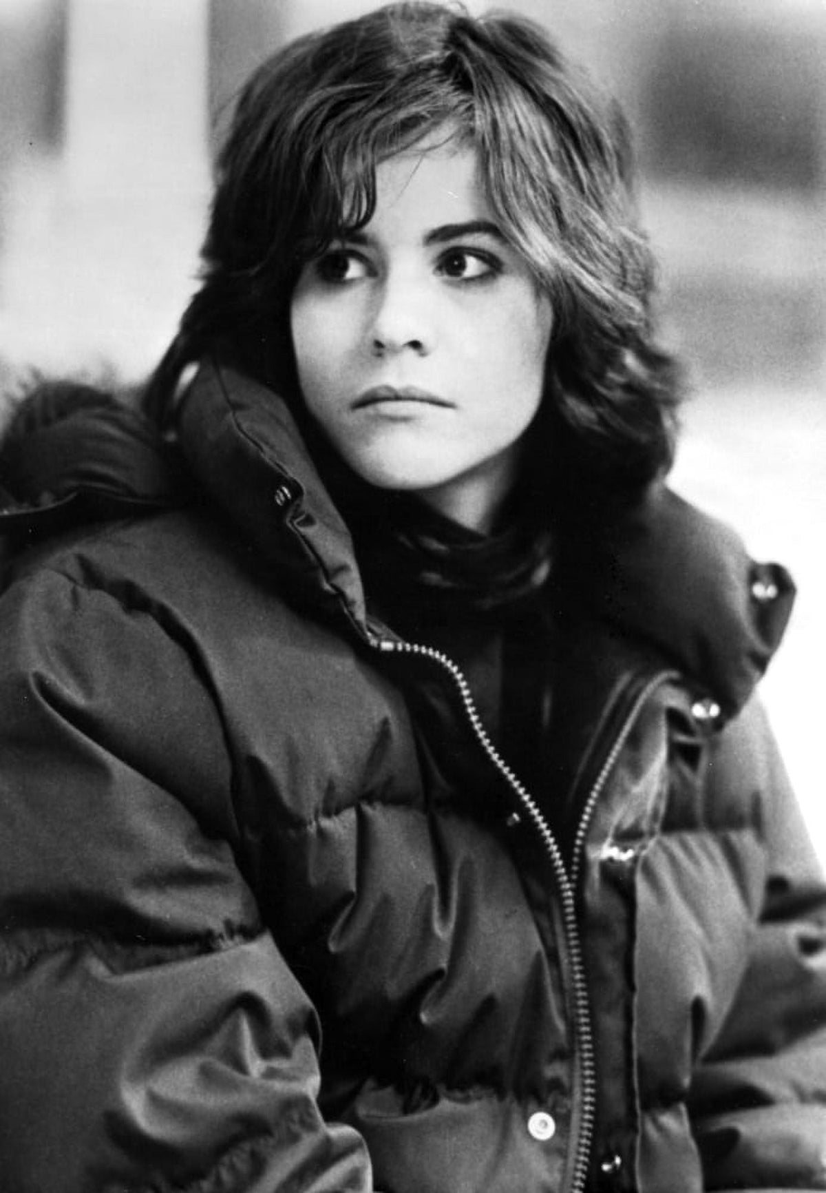 Ally Sheedy portrait photo print looking right in a black jacket