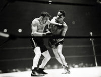 Joe Louis Boxing Match Photo Print showcasing the legendary boxer in action.