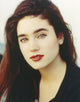 Close-up portrait photo of Jennifer Connelly on a white background.